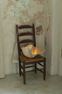Empty chairs on floor at home