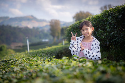 Portrait of girl on plants