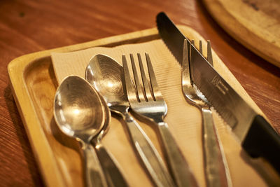 High angle view of fork on table