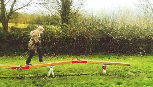 Full length of man playing on field