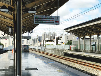 Train on railroad station platform against sky