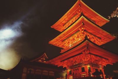 Low angle view of illuminated temple