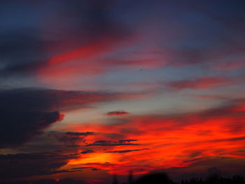 Low angle view of dramatic sky during sunset