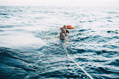 Man swimming in sea