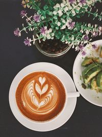 High angle view of cappuccino on table