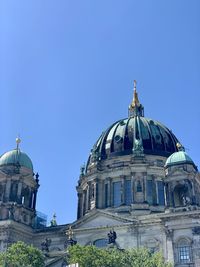 Cathedral of building against clear blue sky