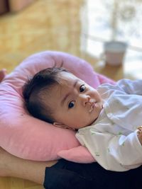 Portrait of cute baby lying down