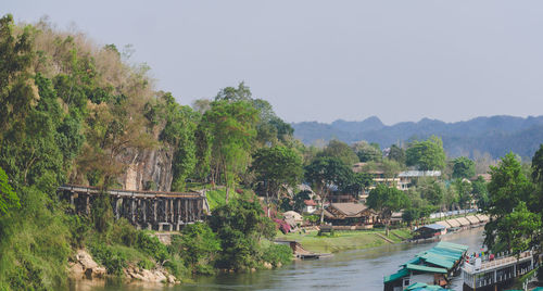 Panoramic view of river and trees against sky