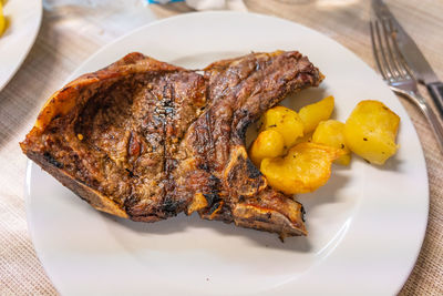 High angle view of food served in plate on table