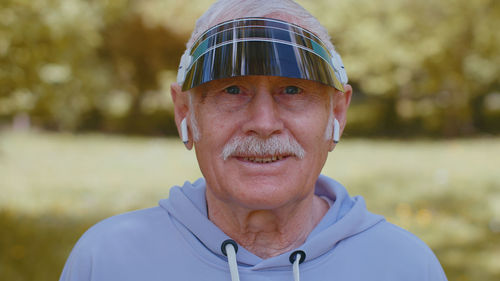 Portrait of senior man wearing cap