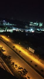 Aerial view of illuminated cityscape at night