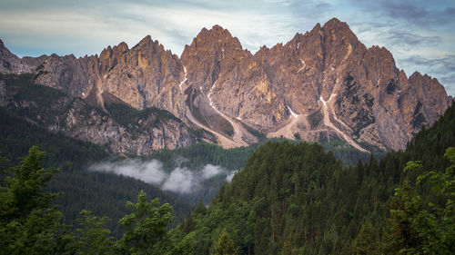 Scenic view of rocky mountains against sky