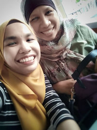 Portrait of a smiling young woman