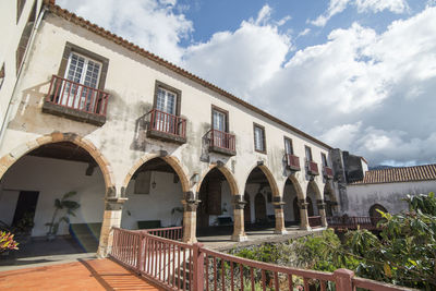 Exterior of historic building against sky