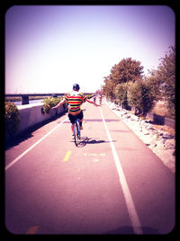 Woman walking on road