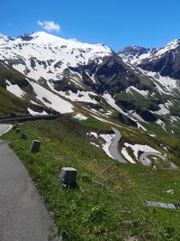 Scenic view of snowcapped mountains against sky