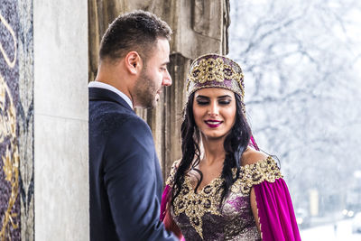 Bride with bridegroom during weeding ceremony