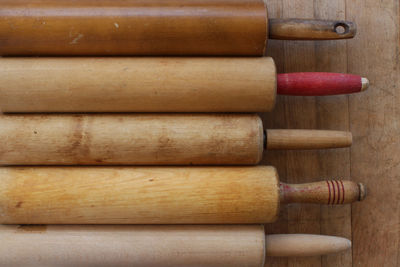 Close-up of wine bottles on wood
