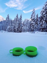 Scenic view of snow covered mountains against sky