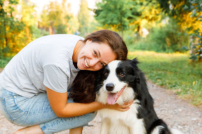 Side view of man with dog