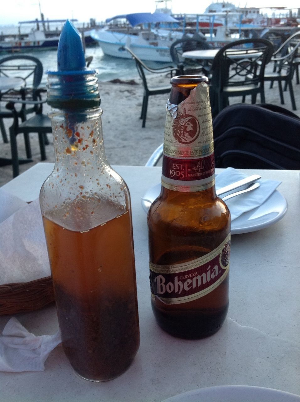 still life, food and drink, close-up, drink, cold temperature, table, focus on foreground, day, refreshment, no people, drinking glass, outdoors, sunlight, container, metal, side by side, glass - material, jar, bottle