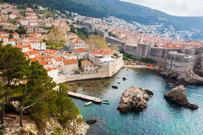 Dubrovnik west pier and medieval fortifications of the city seen from fort lovrijenac