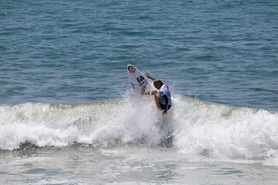 Man surfing on sea