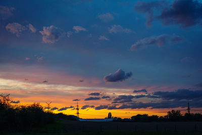 Scenic view of dramatic sky during sunset