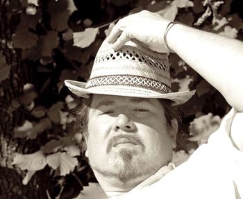 Close-up portrait of man wearing hat