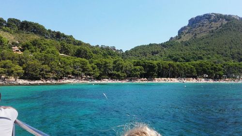 Scenic view of sea against clear blue sky