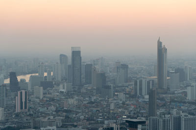 Concept of pollution pm2.5 unhealthy air pollution dust. toxic haze in the city.