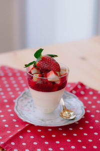 Close-up of strawberry served on table
