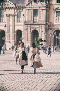 People walking on street in city