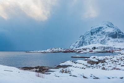 Scenic view of sea against sky during winter