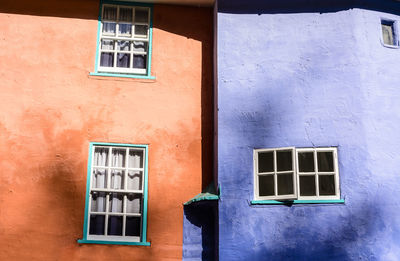 Low angle view of window on wall