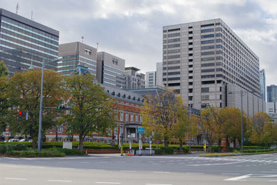 Buildings in city against sky