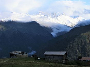 Scenic view of snowcapped mountains against sky