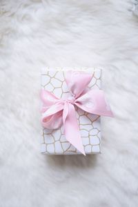 High angle view of pink flower on floor