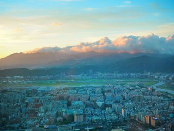 High angle view of townscape against sky during sunset