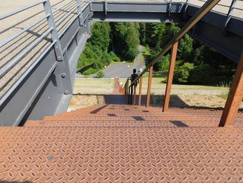 High angle view of staircase by swimming pool