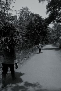 View of people walking on road