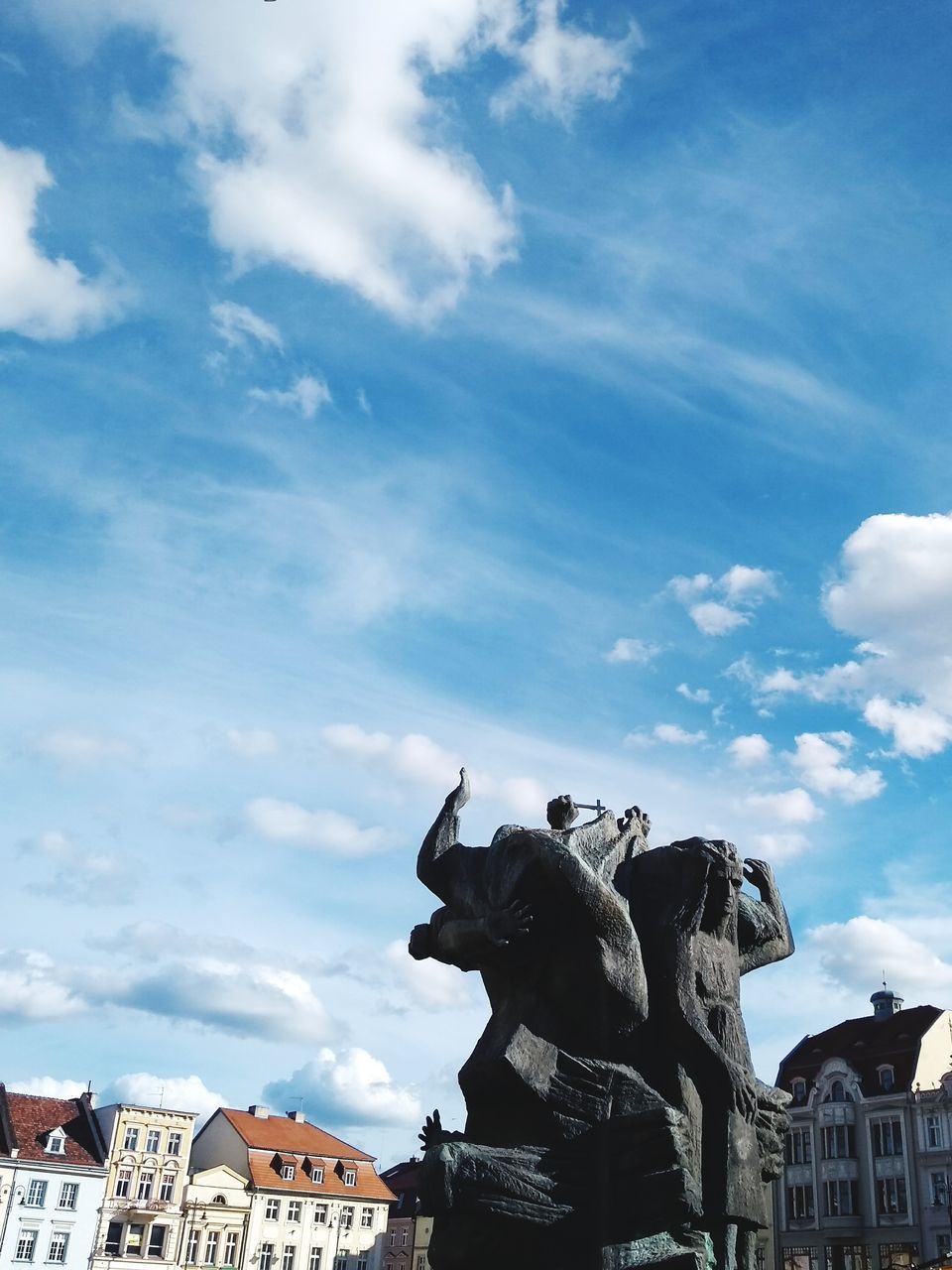 cloud - sky, sky, representation, architecture, sculpture, art and craft, statue, creativity, built structure, no people, building exterior, craft, day, mammal, nature, low angle view, human representation