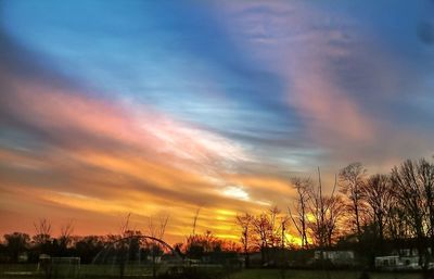 Scenic view of landscape against cloudy sky
