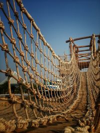 Low angle view of rope against clear sky