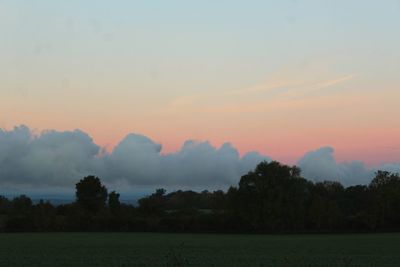 Scenic view of landscape at sunset