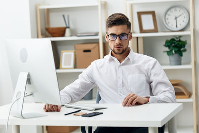 Businesswoman working at desk in office