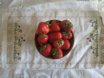 High angle view of strawberries on table