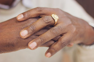 Cropped image of hand wearing ring