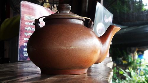 Close-up of pot on table