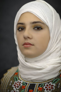 Close-up portrait of beautiful young woman wearing hijab